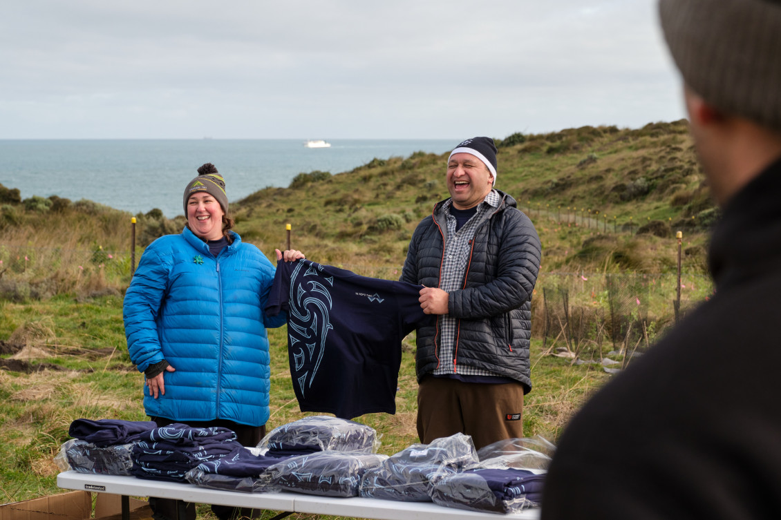 Rōpū Tiaki board member Megan Somerville (left) and co-chair Lee Hunter (right) reveal a new tohu for the Parangarahu Lakes Area